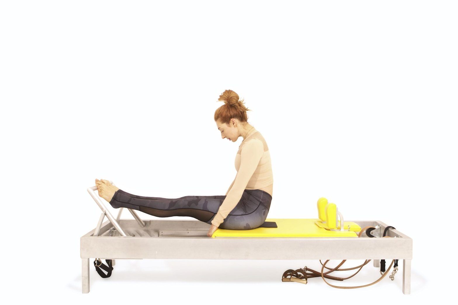stomach-massage-round-on-the-reformer - Online Pilates Classes