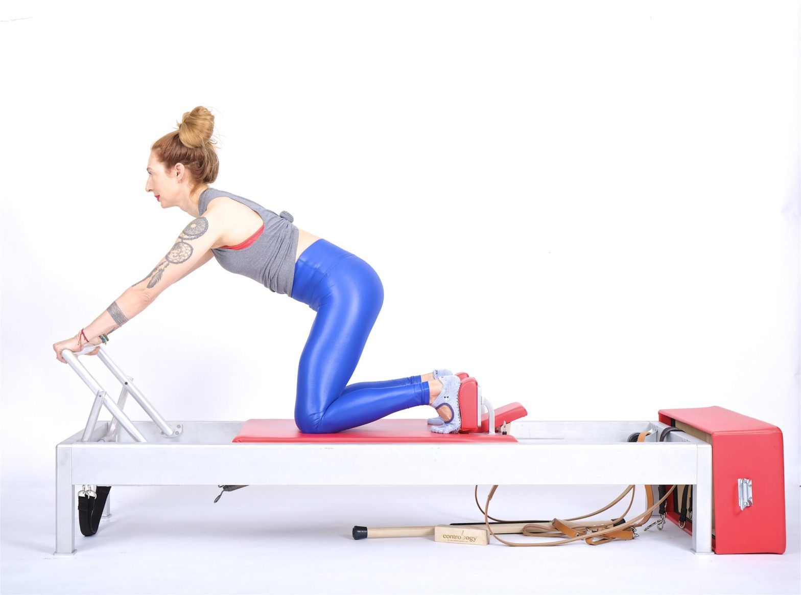 Knee Stretches Arched Back on the Reformer - Online Pilates Classes