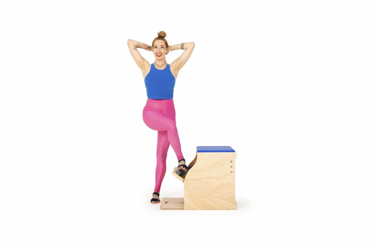 Press-Down-Cross-Over-on-the-Wunda-Chair - Online Pilates Classes