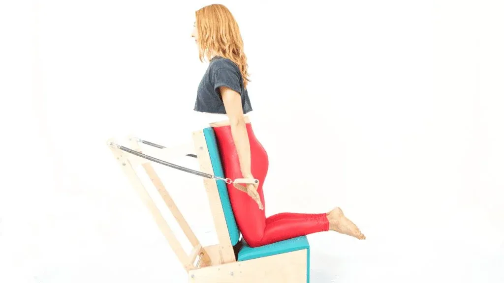 Pulling-Straps-on-the-Arm-Chair-1 - Online Pilates Classes