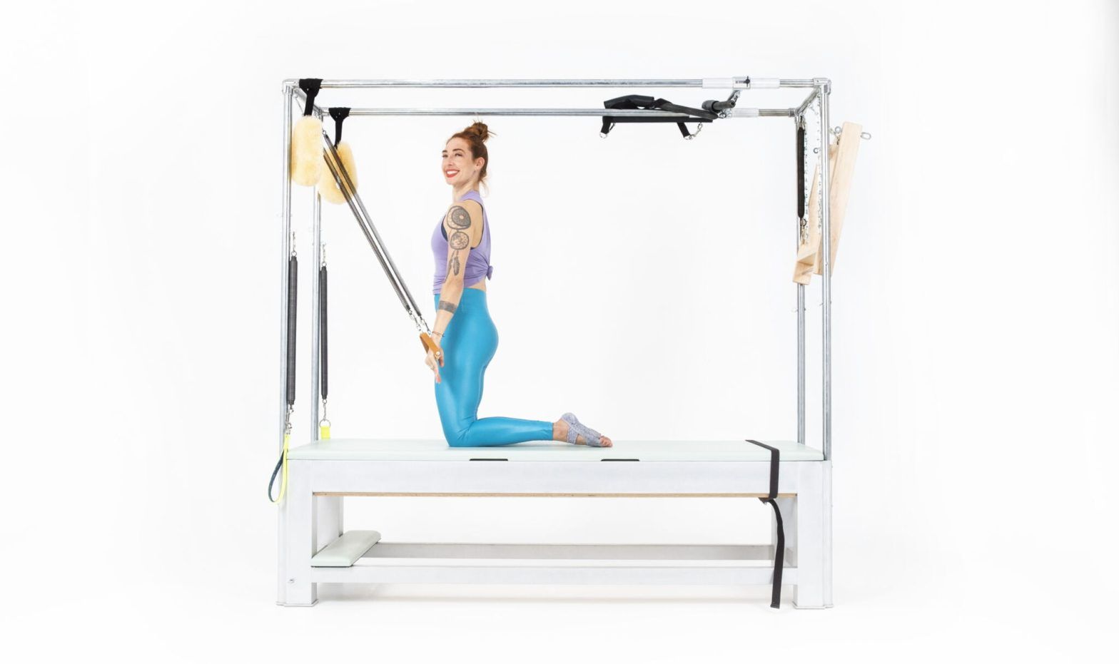 Chest-Expansion-with-Arm-Springs-on-the-Cadillac-or-Tower Online Pilates Classes