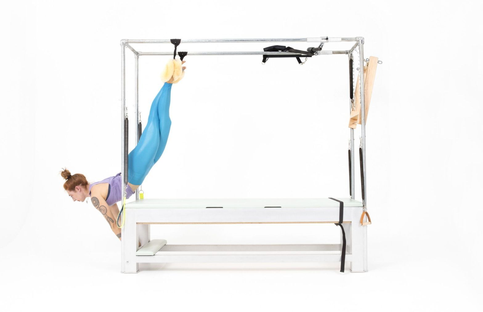 Hanging-Variations-on-the-Cadillac Online Pilates Classes