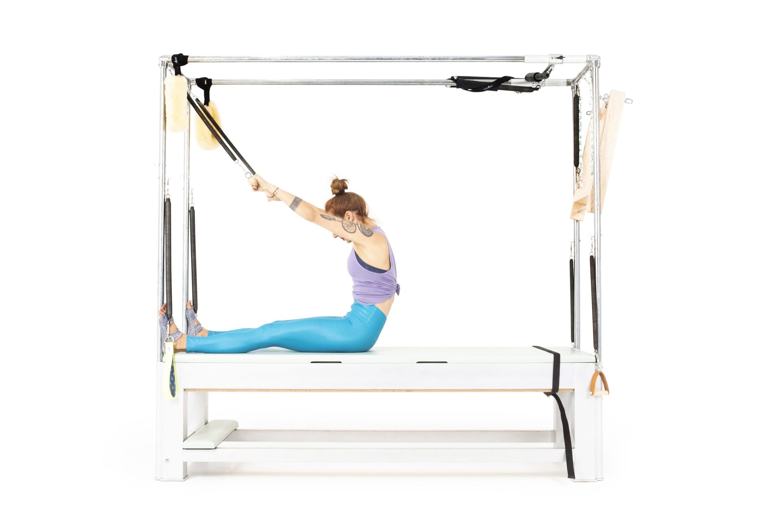 Roll-Down-with-Roll-Back-Bar-on-the-Cadillac-or-Tower Online Pilates Classes