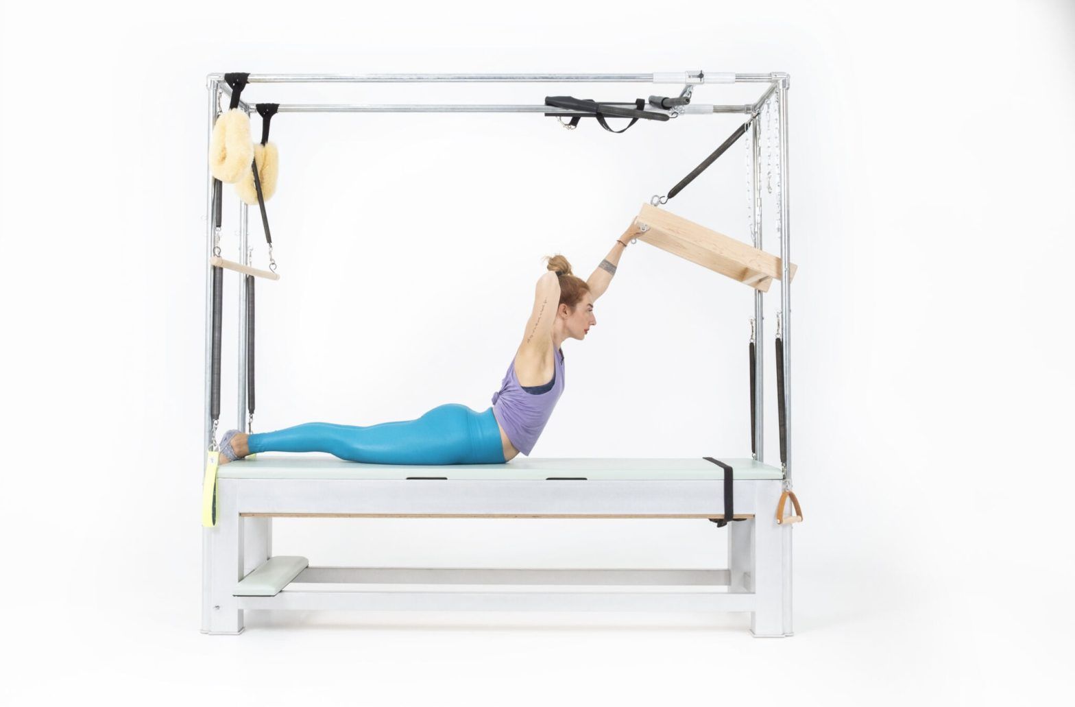 Single Arm Swan with Push Thru Bar on the Cadillac or Tower Online Pilates Classes
