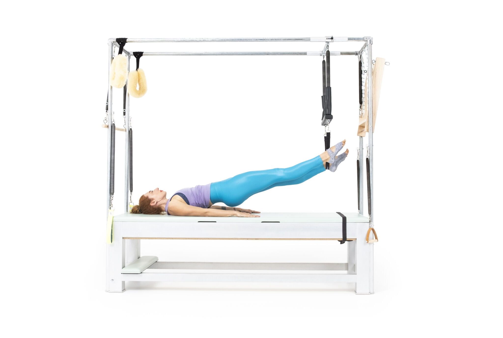 Single Leg Hip Lifts with Trapeze on the Cadillac Online Pilates Classes