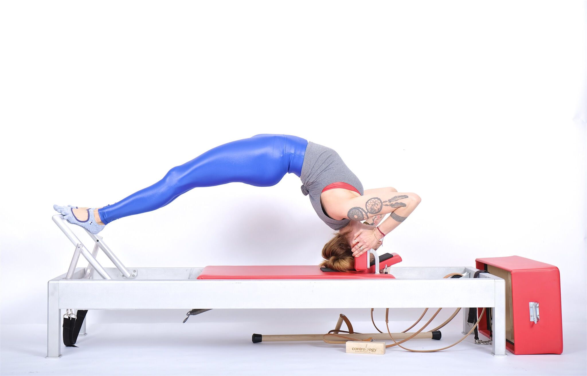 Headstand-Facing-Up-on-the-Reformer-Online Pilates Classes