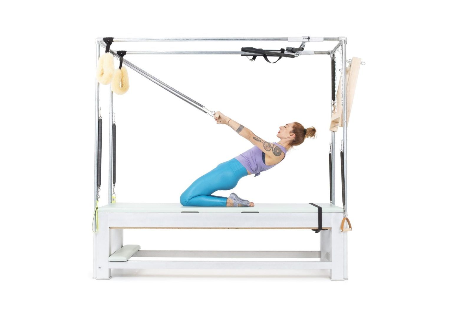 Thigh Stretch with Roll Back Bar on the Cadillac or Tower Online Pilates Classes