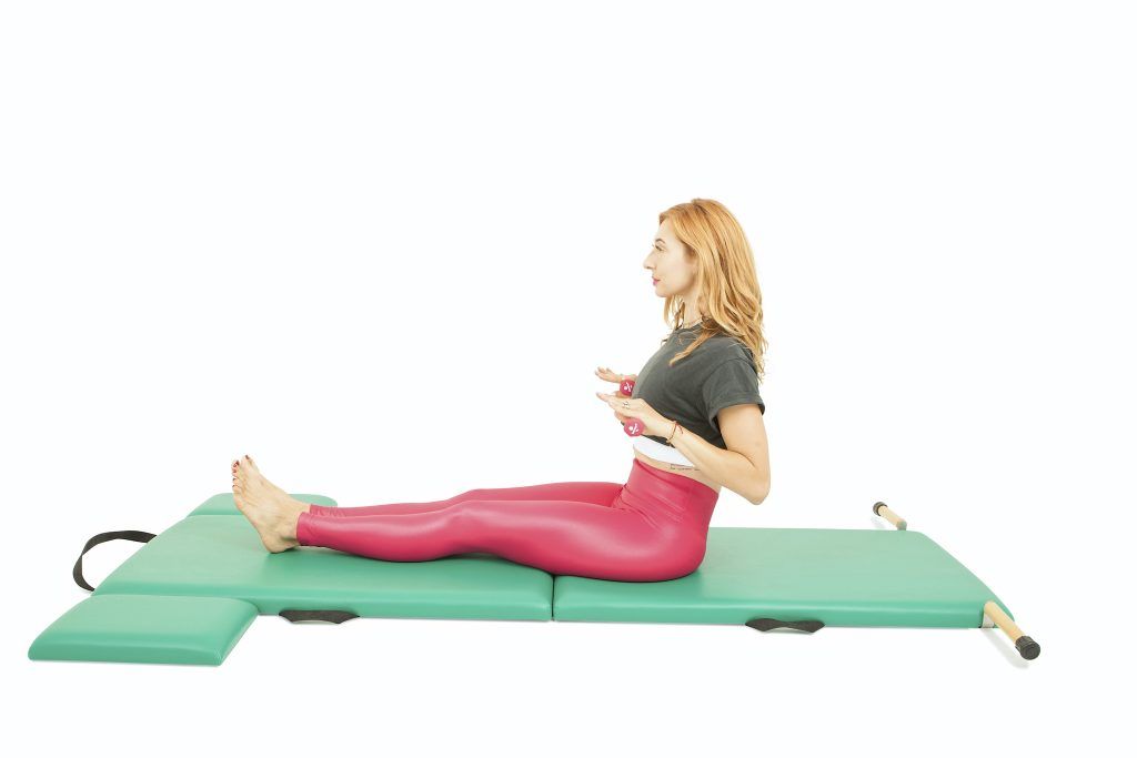 from the chest with weights on the mat online pilates classes